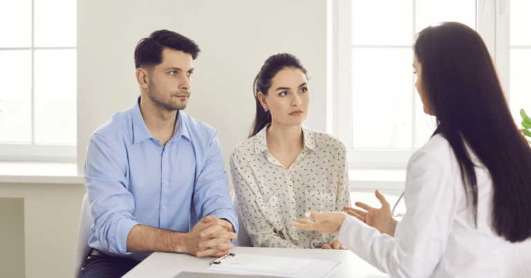 Hopeful woman in a therapy session receiving infertility counseling in Houston TX.