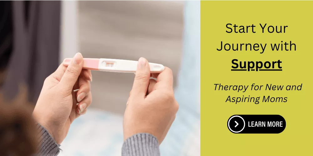 Person holding a positive pregnancy test with message about starting therapy for new and aspiring moms following fertility treatments.