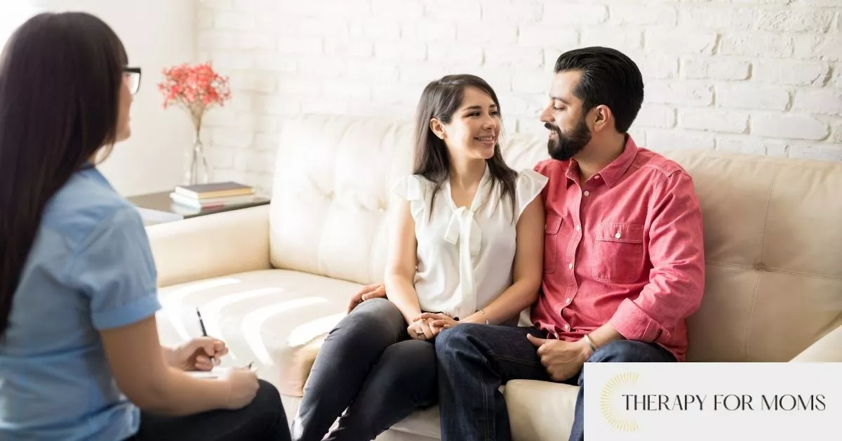 Couple in couples counseling for new parents to find the strength they need back to their relationship after having a baby.